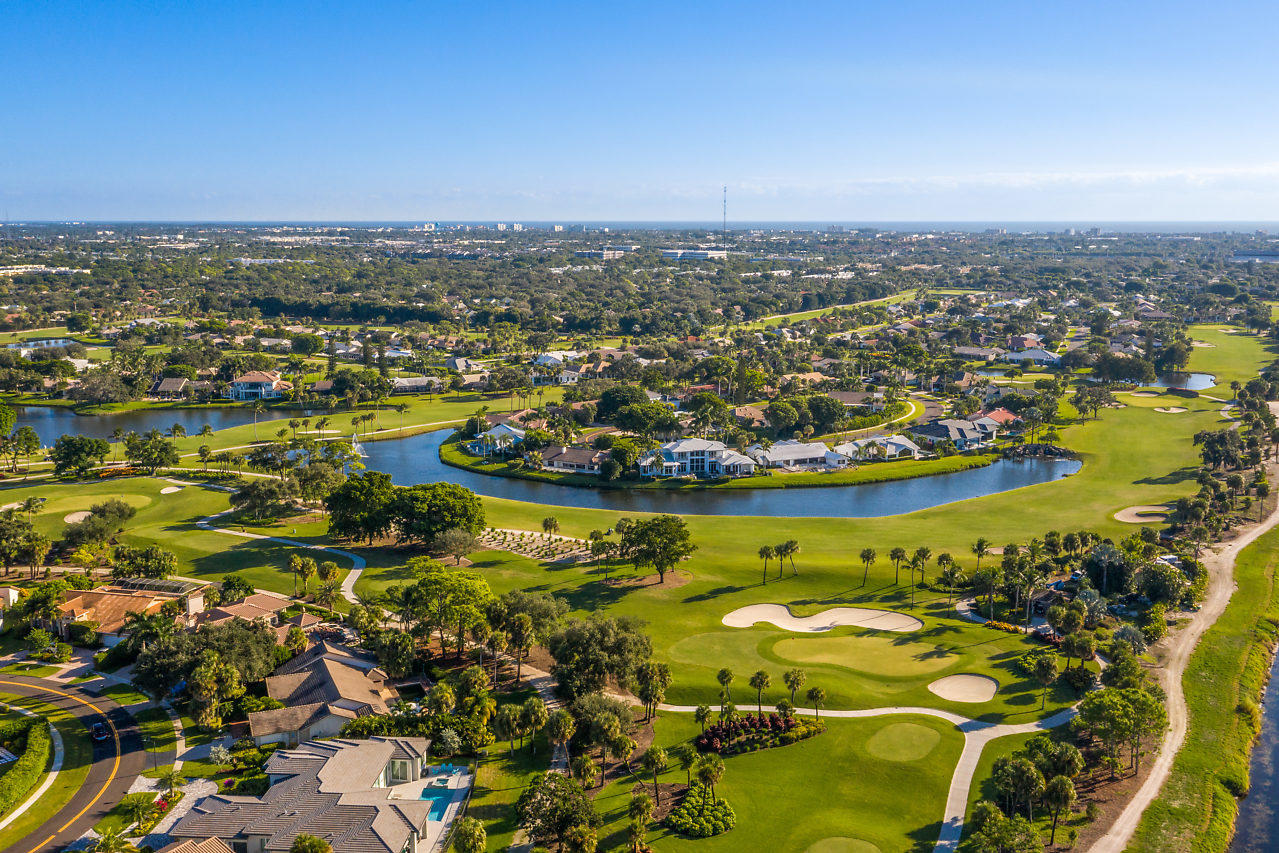 4572 White Cedar Lane Delray Beach, FL 33445 - Photo 22 of 37 an aerial view of residential houses with outdoor space