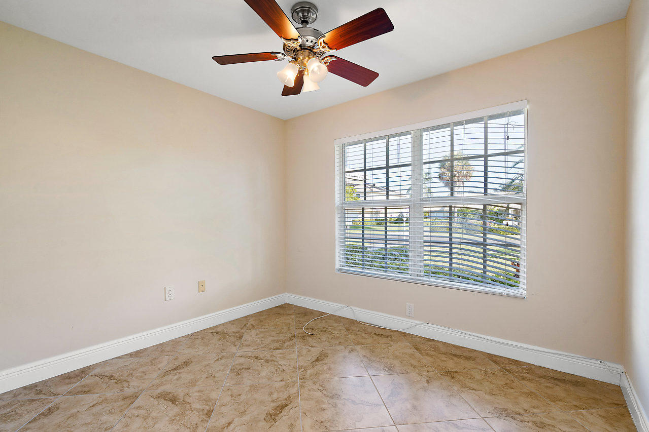 4572 White Cedar Lane Delray Beach, FL 33445 - Photo 27 of 37 a view of an empty room with a window
