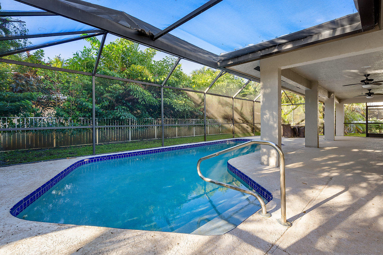 4572 White Cedar Lane Delray Beach, FL 33445 - Photo 34 of 37 a view of swimming pool with a patio