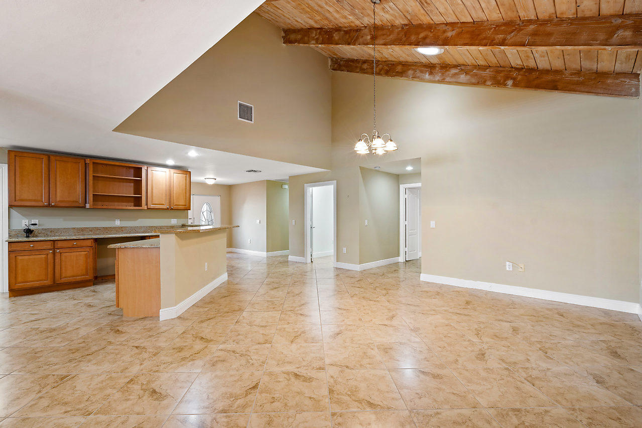 4572 White Cedar Lane Delray Beach, FL 33445 - Photo 5 of 37 a view of a kitchen with a sink and cabinets