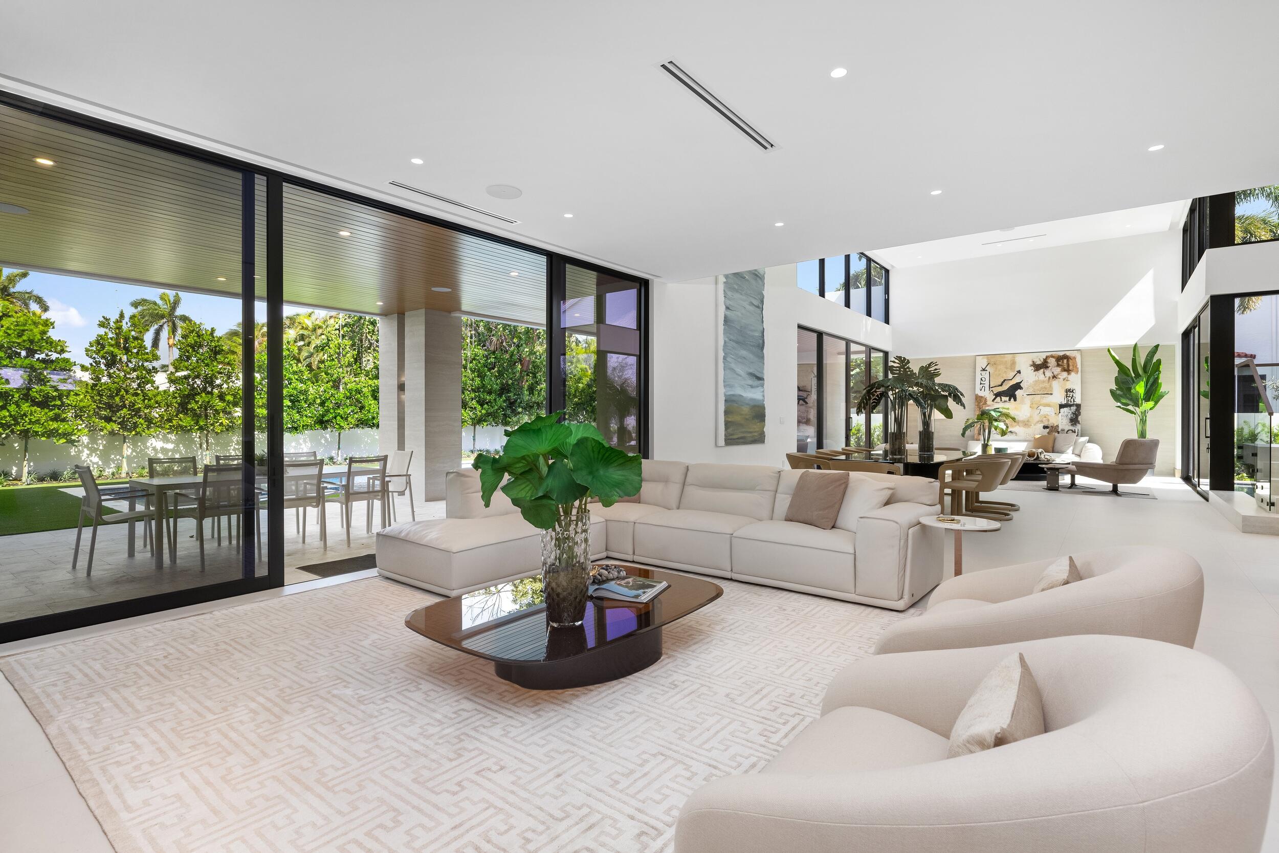 1351 Cocoanut Road Boca Raton, FL 33432 - Photo 45 of 101 a living room with furniture and a potted plant