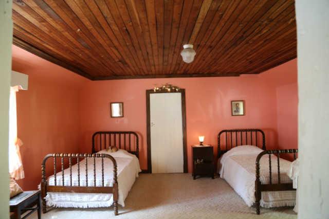 25 Sykes Road Hickman, TN 38567 - Photo 11 of 20 Bonus room is located off of Bedroom 3 and could also be used as a 4th bedroom. Walk in attic space is behing the door that you see.