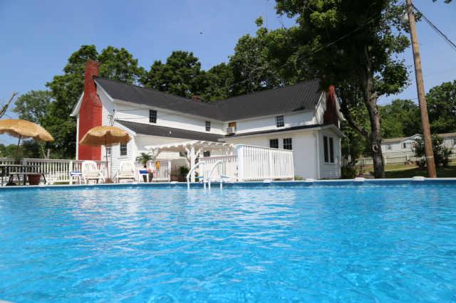 25 Sykes Road Hickman, TN 38567 - Photo 15 of 20 Another view of the pool and the rear of the home.....