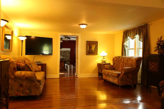 25 Sykes Road Hickman, TN 38567 - Photo 3 of 20 Family room located between living room and kitchen. Could also be a separate dining room.
