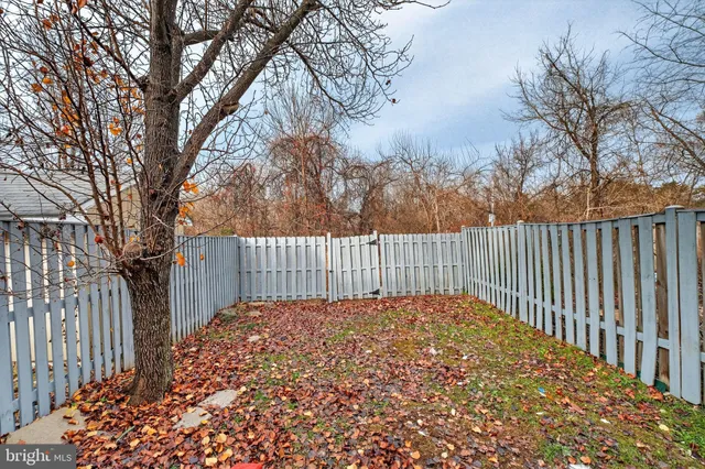 a view of a wooden fence