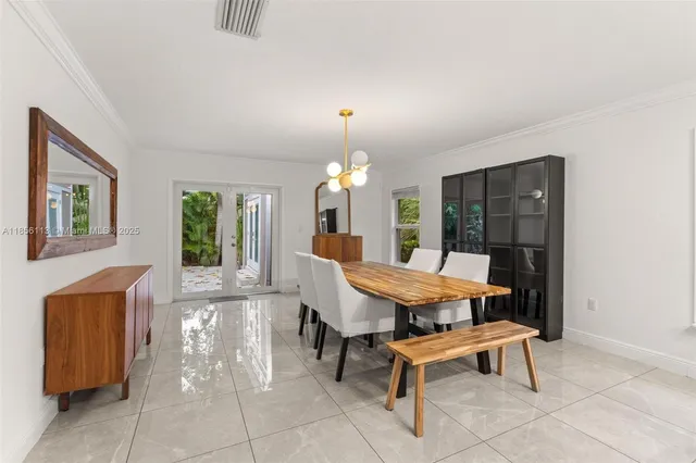 a outdoor dining space with furniture and window
