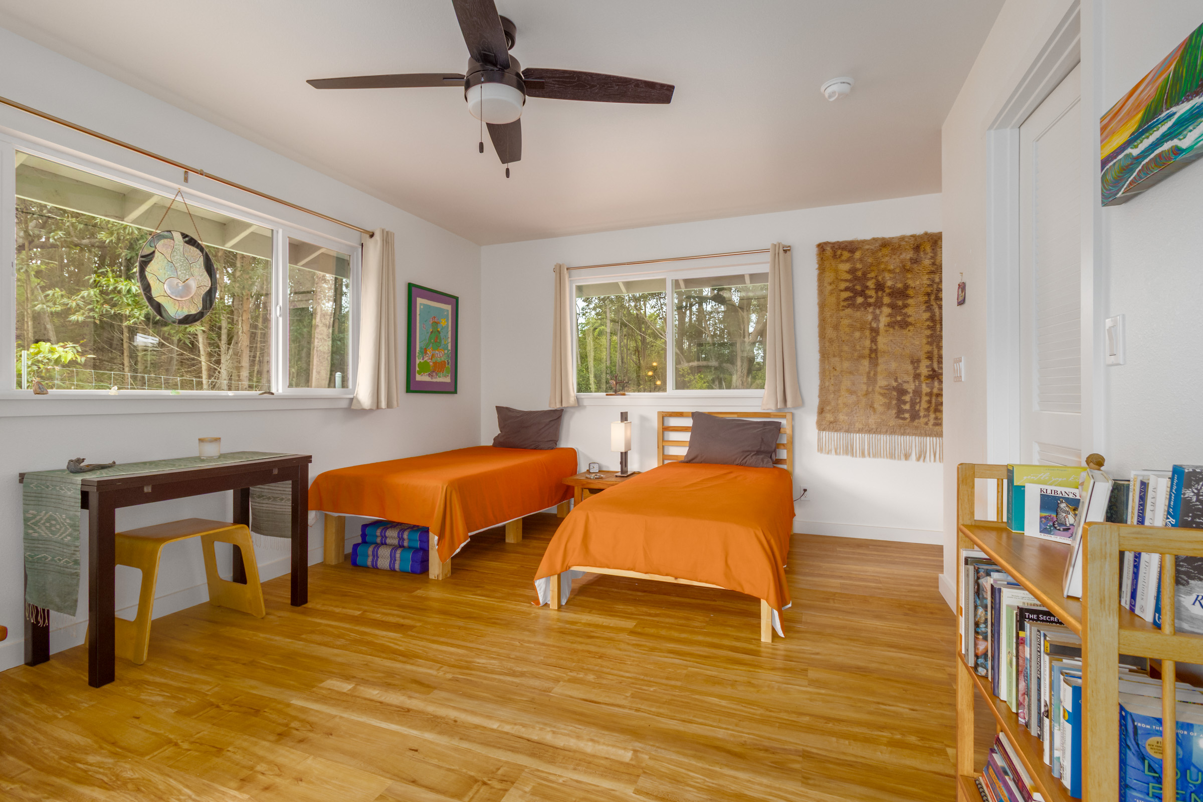 43-2114 Pohakea Mauka Road Paauilo, HI 96776 - Photo 21 of 30 a bedroom with furniture and a large window
