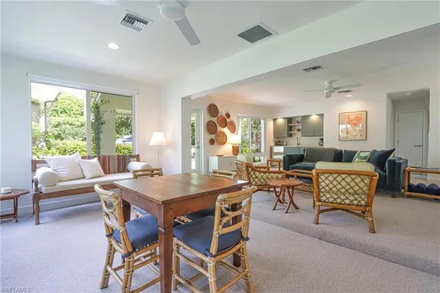 a view of a dining room with furniture