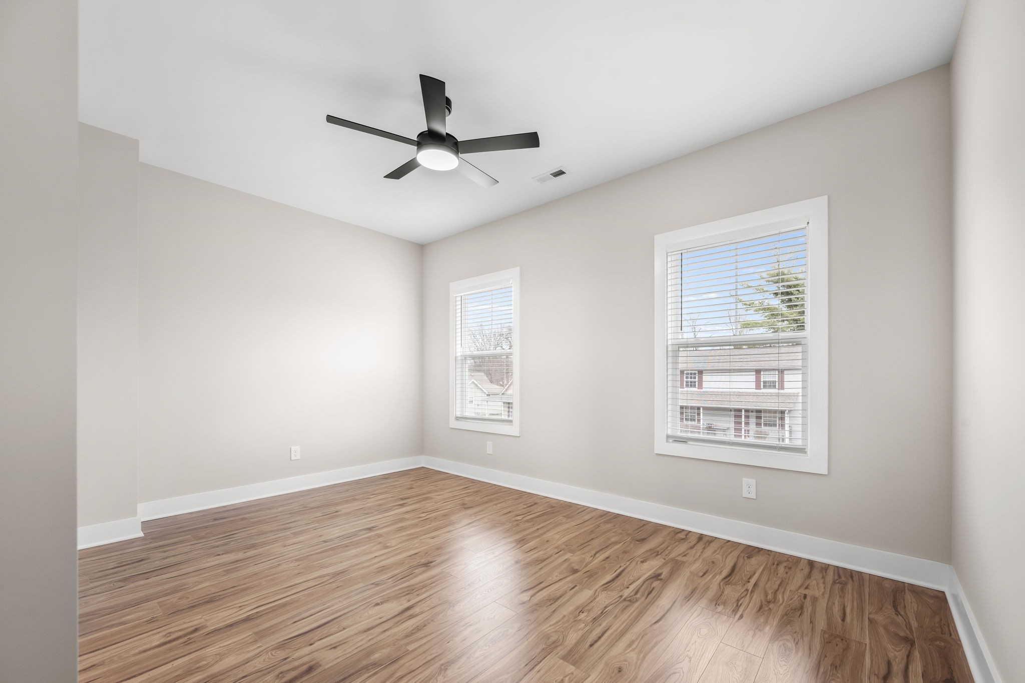 454 East State Street Murfreesboro, TN 37130 - Photo 31 of 41 a view of empty room with wooden floor and fan