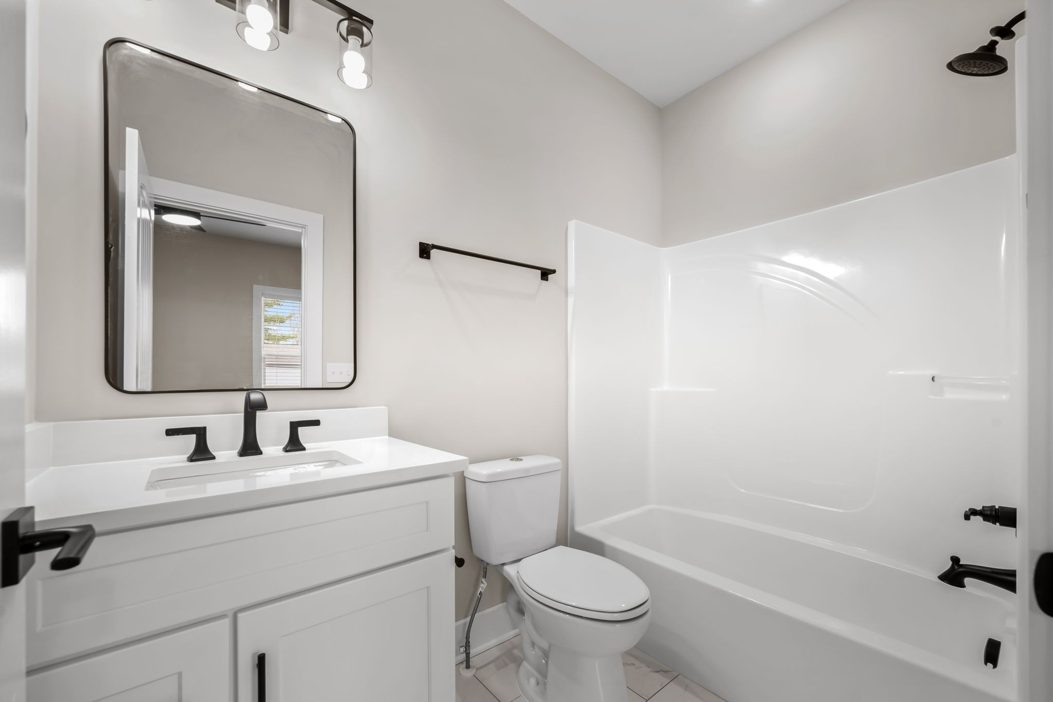 454 East State Street Murfreesboro, TN 37130 - Photo 33 of 41 a bathroom with a sink toilet and shower