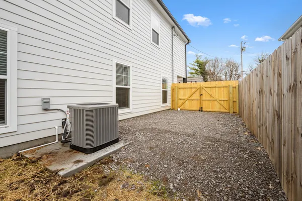 a view of a storage house in the back yard