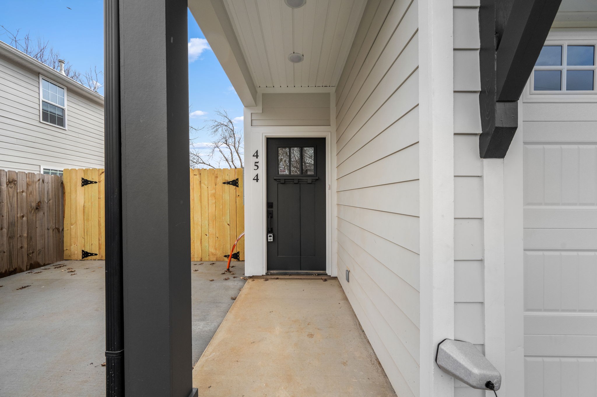 454 East State Street Murfreesboro, TN 37130 - Photo 5 of 41 a view of a brick house with a large door