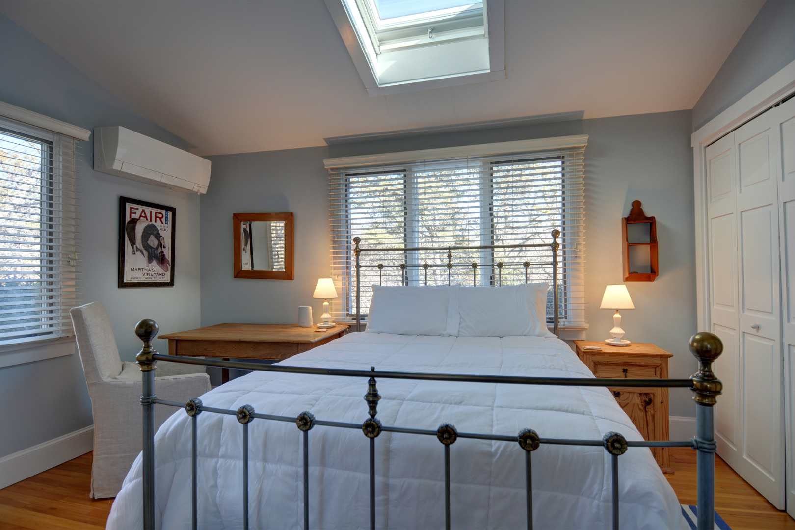 1 Smith Lane Chilmark, MA 02535 - Photo 15 of 27 a bedroom with a bed and wooden floor