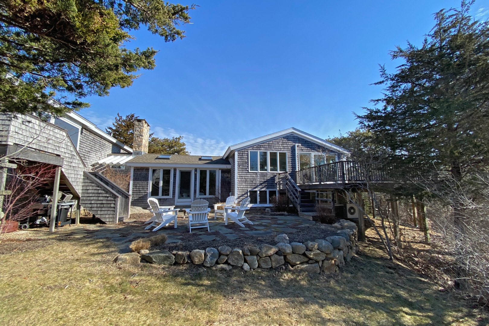 1 Smith Lane Chilmark, MA 02535 - Photo 2 of 27 a front view of a house with yard porch and sitting area