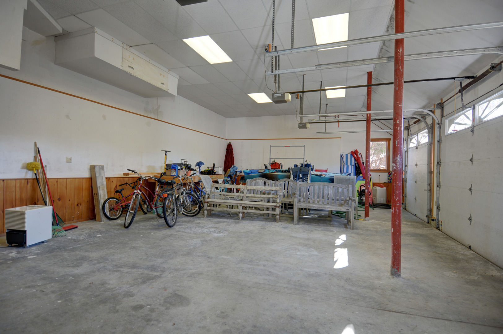 1 Smith Lane Chilmark, MA 02535 - Photo 25 of 27 a view of a storage room with lots of swings and chairs