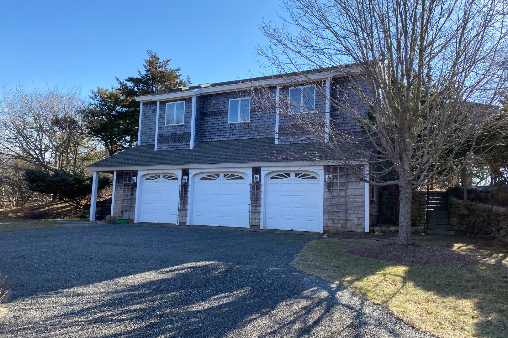 1 Smith Lane Chilmark, MA 02535 - Photo 26 of 27 a front view of a house with a yard