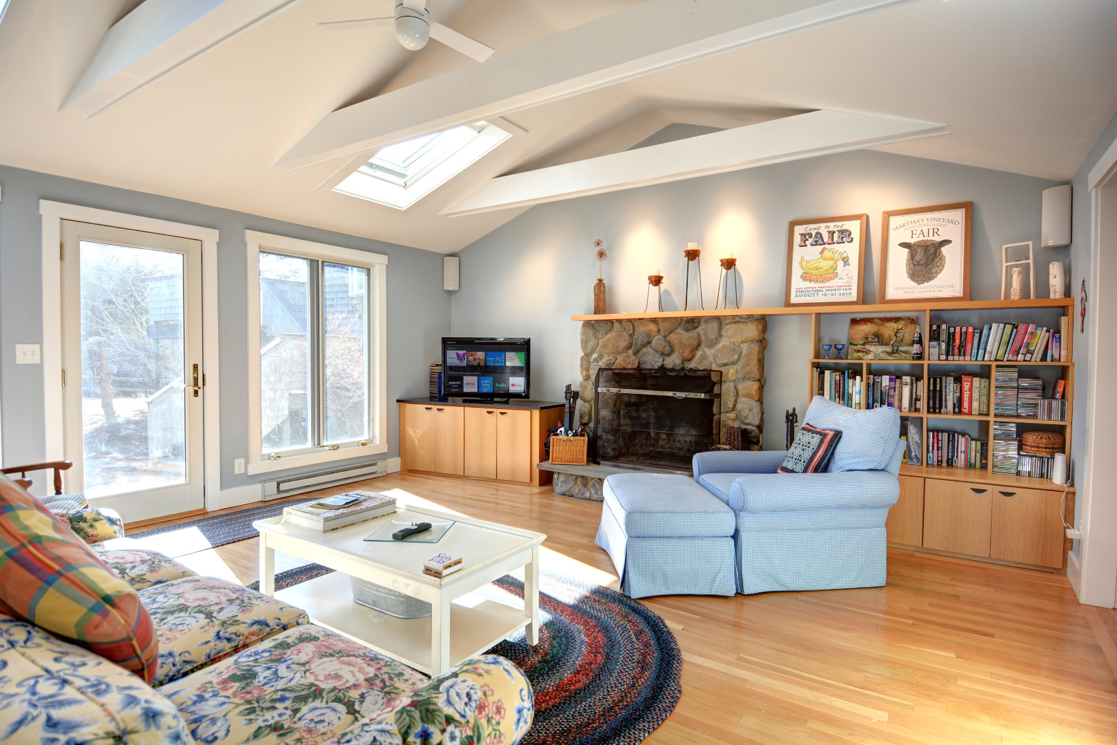 1 Smith Lane Chilmark, MA 02535 - Photo 4 of 27 a living room with furniture large window and a fireplace
