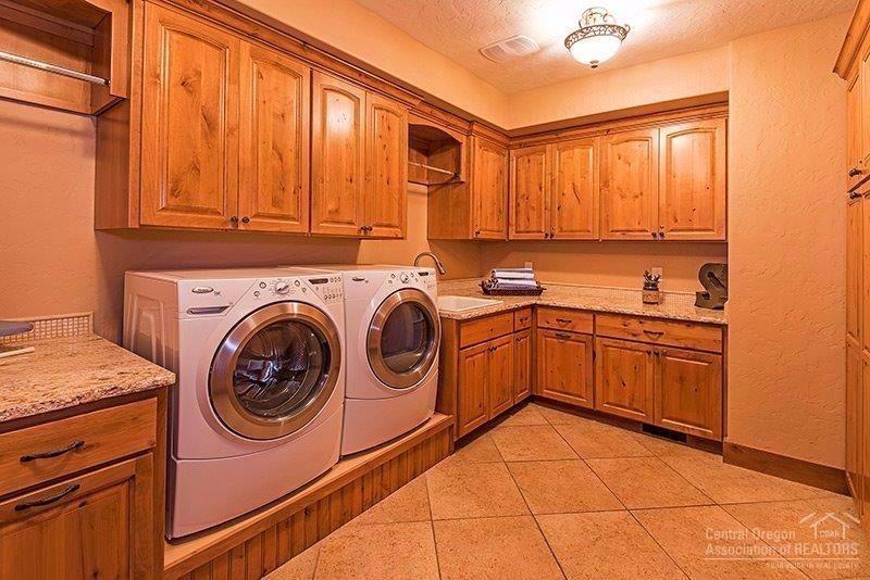 144 Sunstone Loop Bend, OR 97707 - Photo 21 of 24 Located just off the garage, the utility