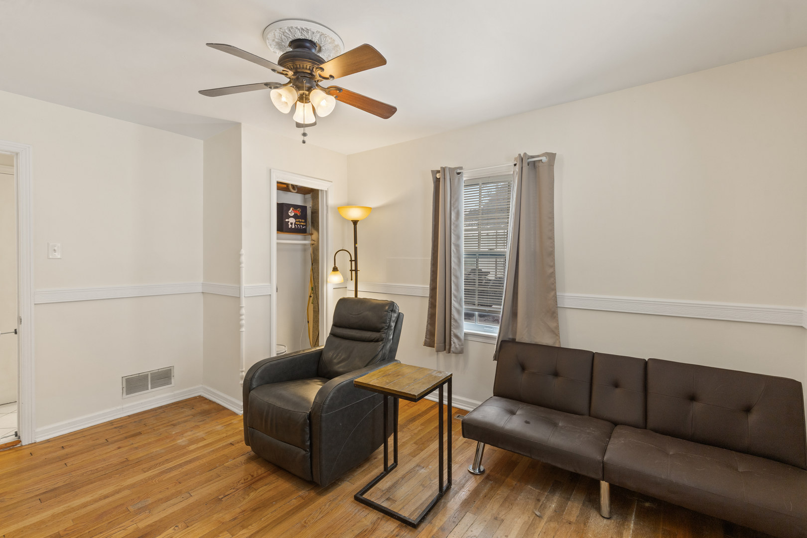 1340 Lennington Circle Northeast Kankakee, IL 60901 - Photo 13 of 25 a living room with furniture and a chandelier