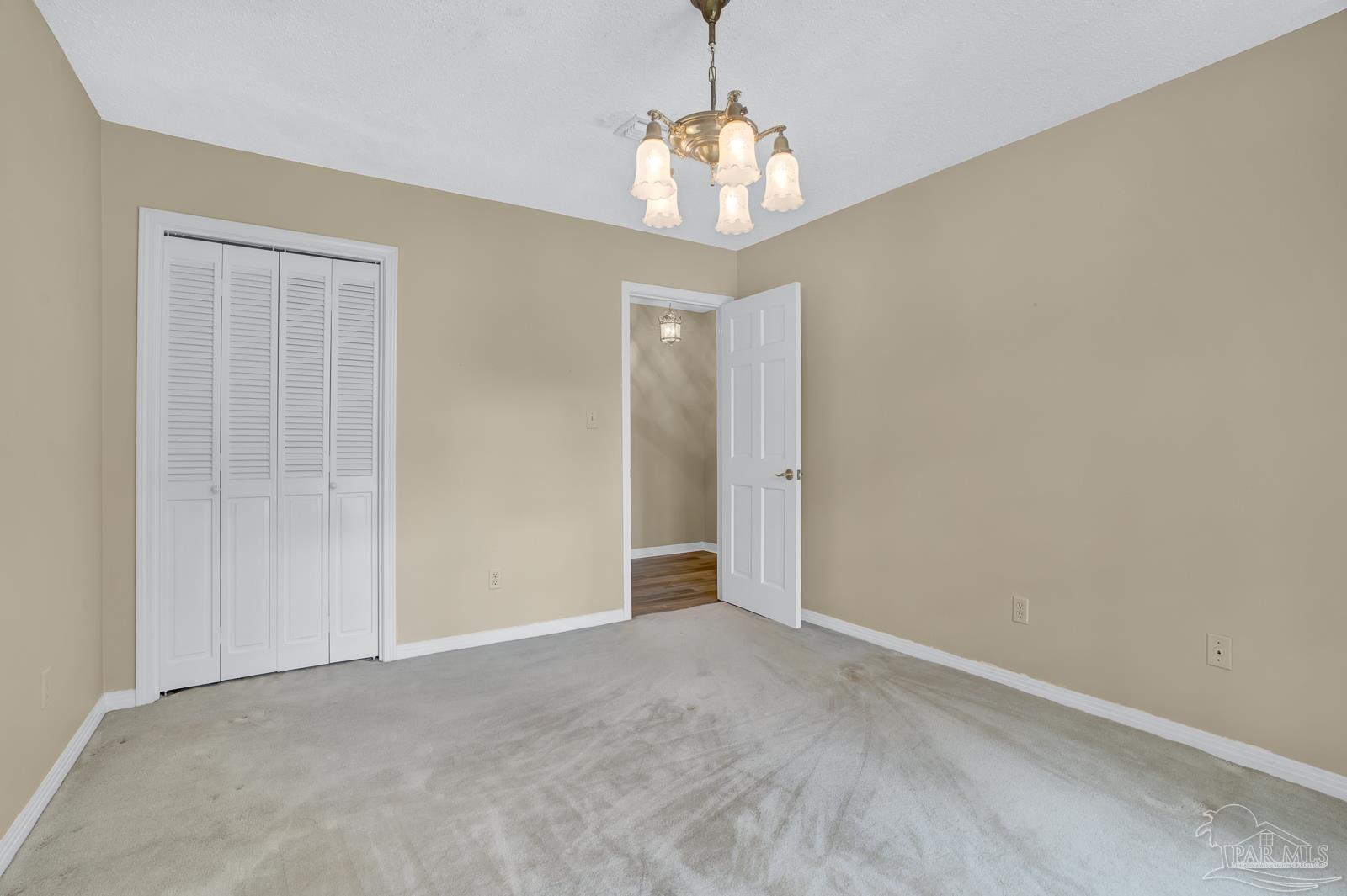 5036 Hamilton Lane Pace, FL 32571 - Photo 26 of 37 a view of an empty room with a window
