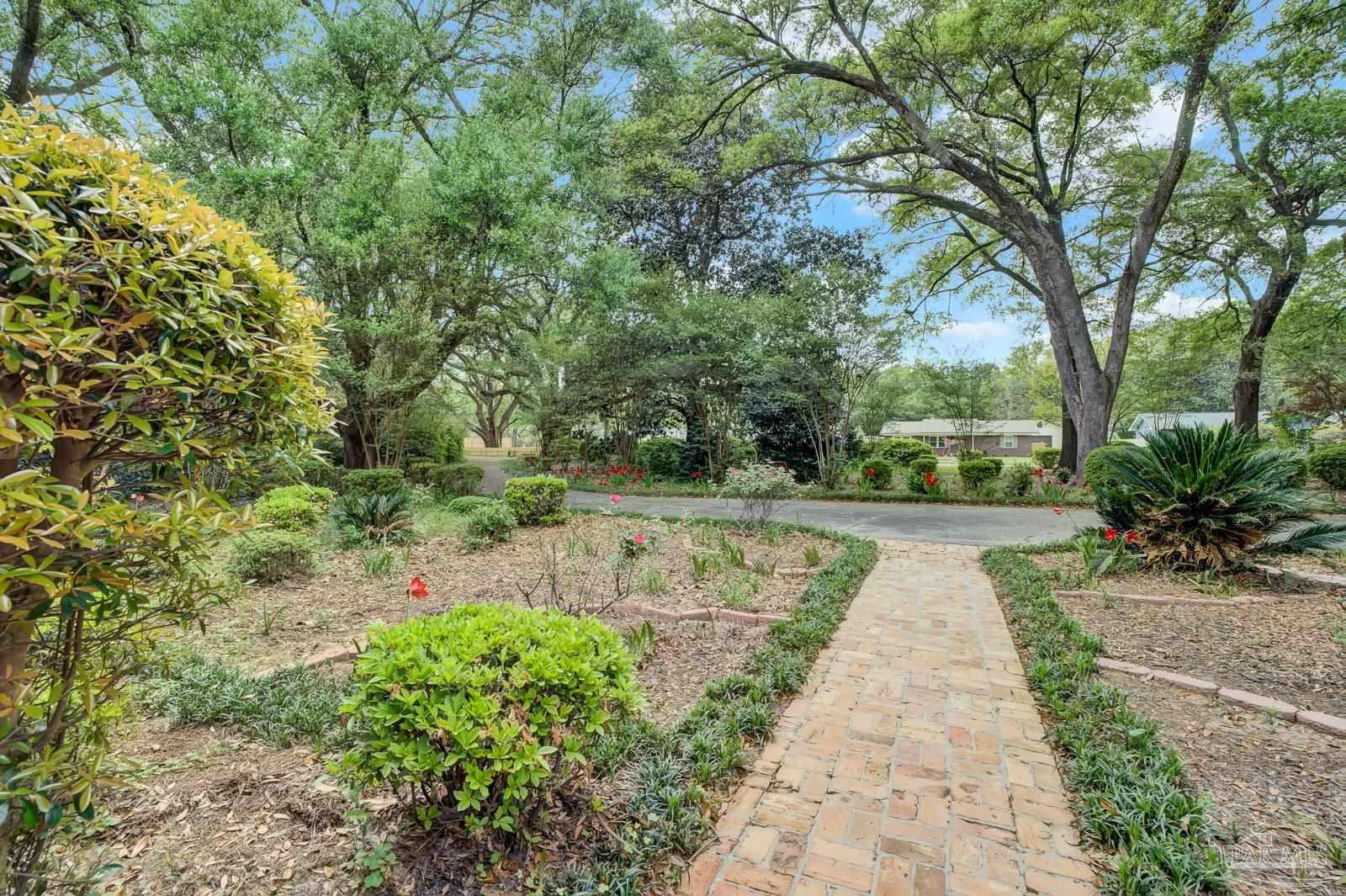 5036 Hamilton Lane Pace, FL 32571 - Photo 34 of 37 a view of park with trees