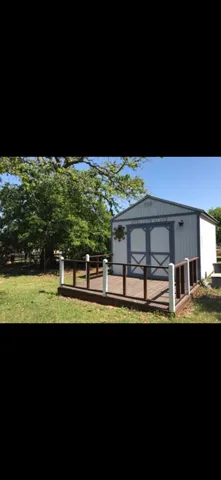 a view of swimming pool and outdoor seating