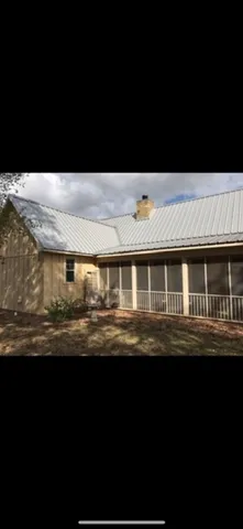 a view of house with outdoor space