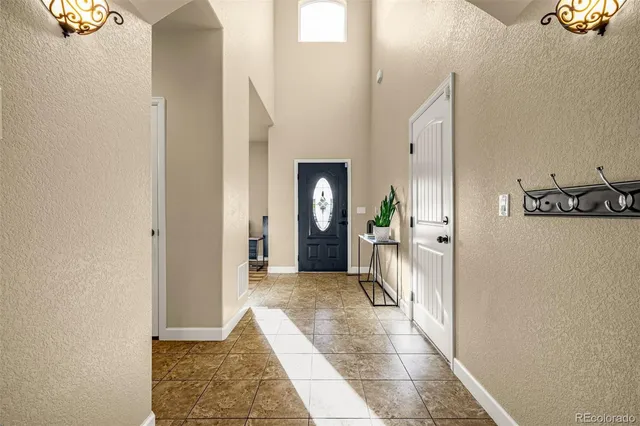 a view of a hallway view with staircase