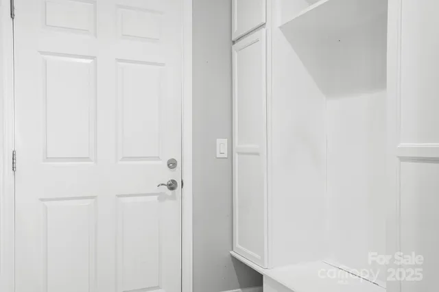 a view of road with large trees