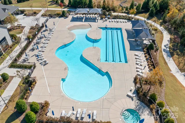 a view of residential houses with outdoor space