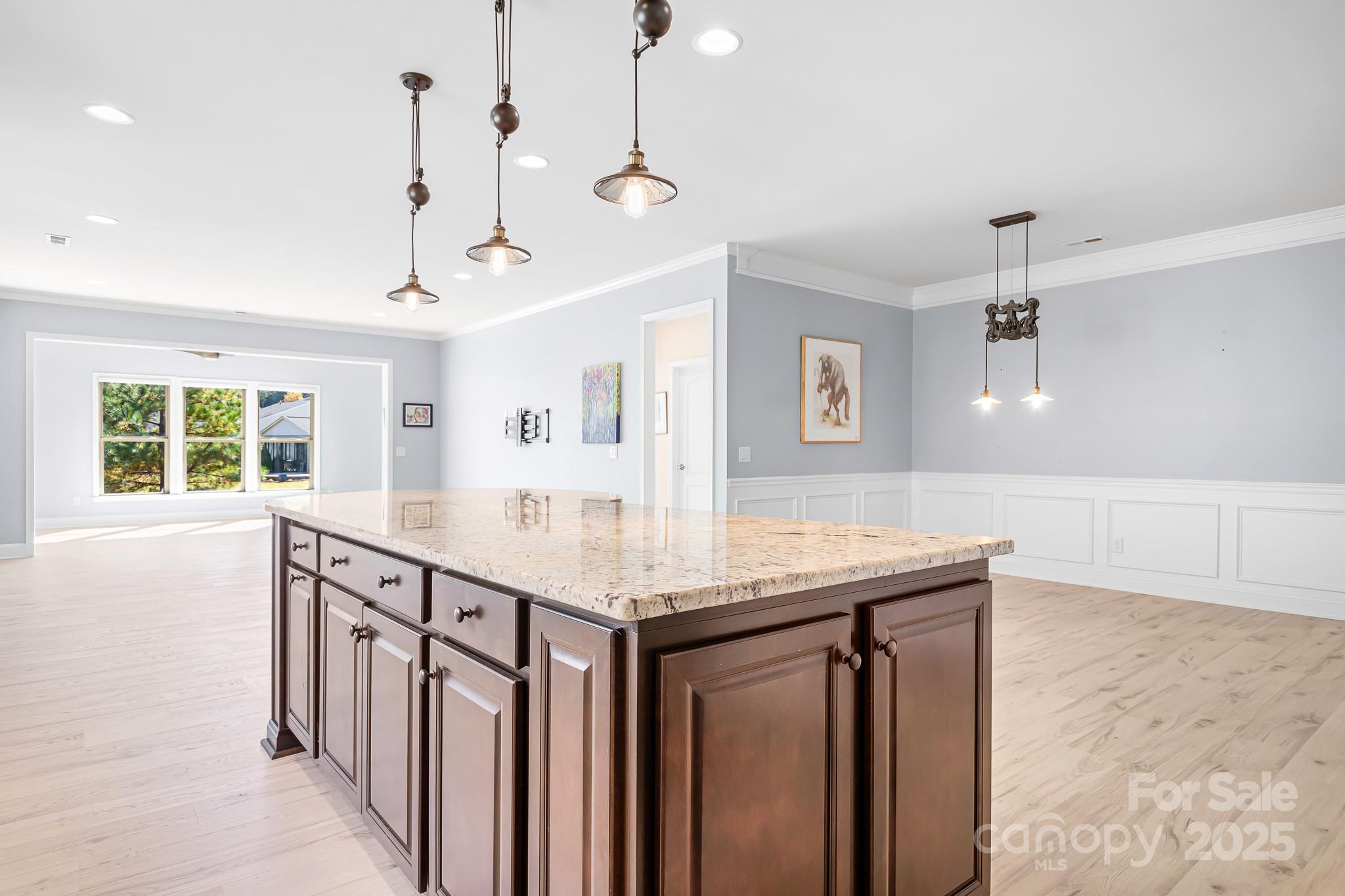 910 Kirby Drive Fort Mill, SC 29715 - Photo 7 of 30 a kitchen with stainless steel appliances granite countertop a kitchen island a stove and a sink