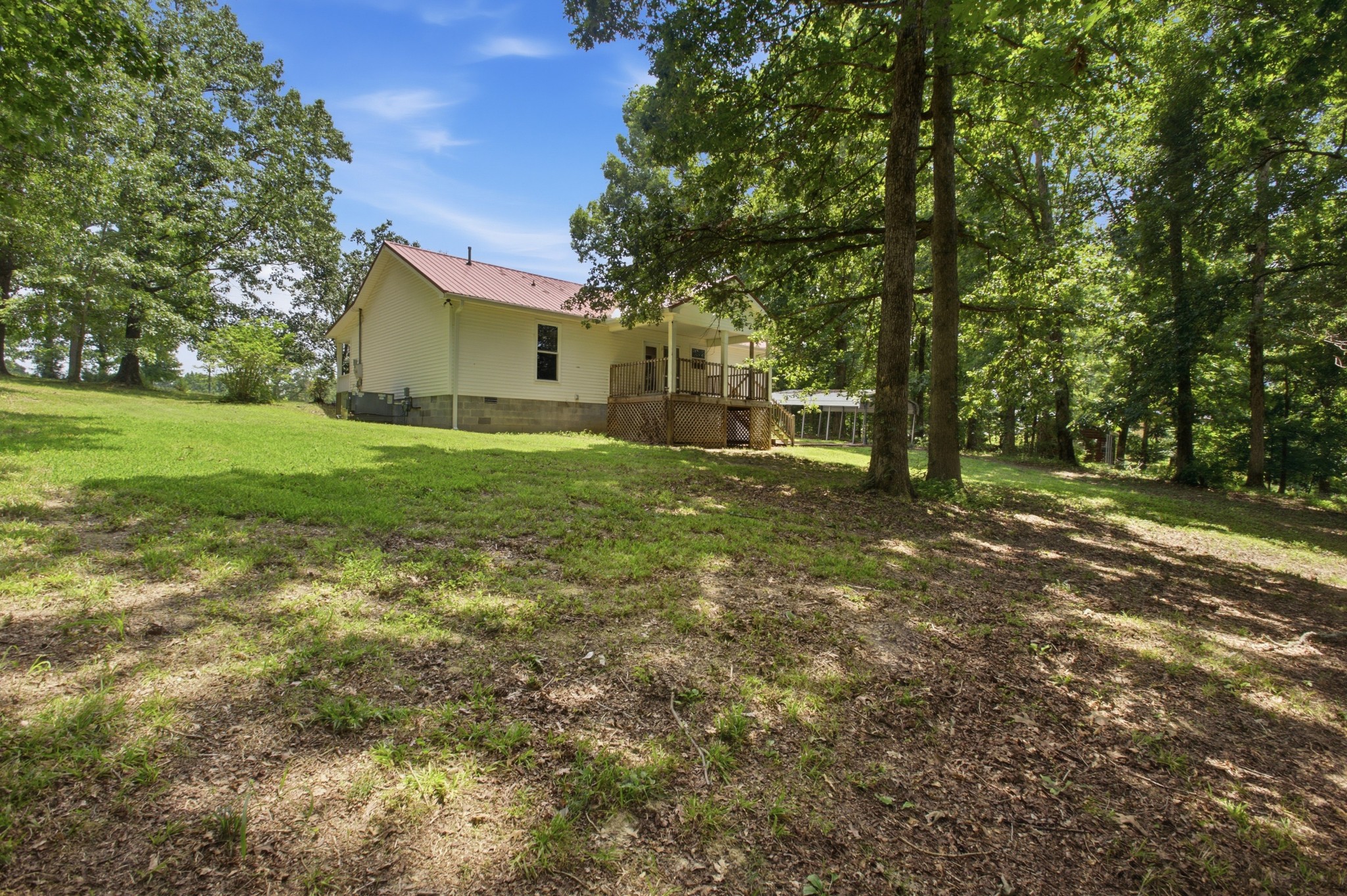 1466 West Grab Creek Road Dickson, TN 37055 - Photo 30 of 30 a view of a house with a yard