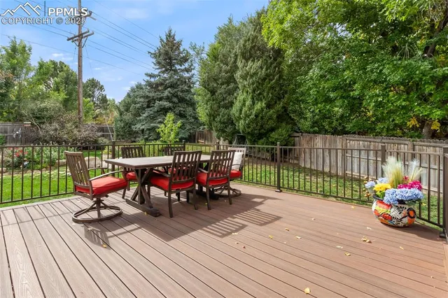 a view of a deck with furniture