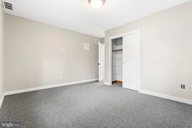 an empty room with an entryway