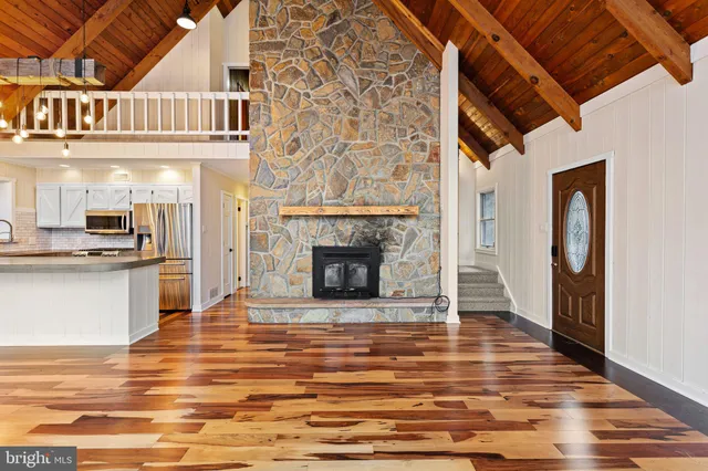 a view of a livingroom with a fireplace