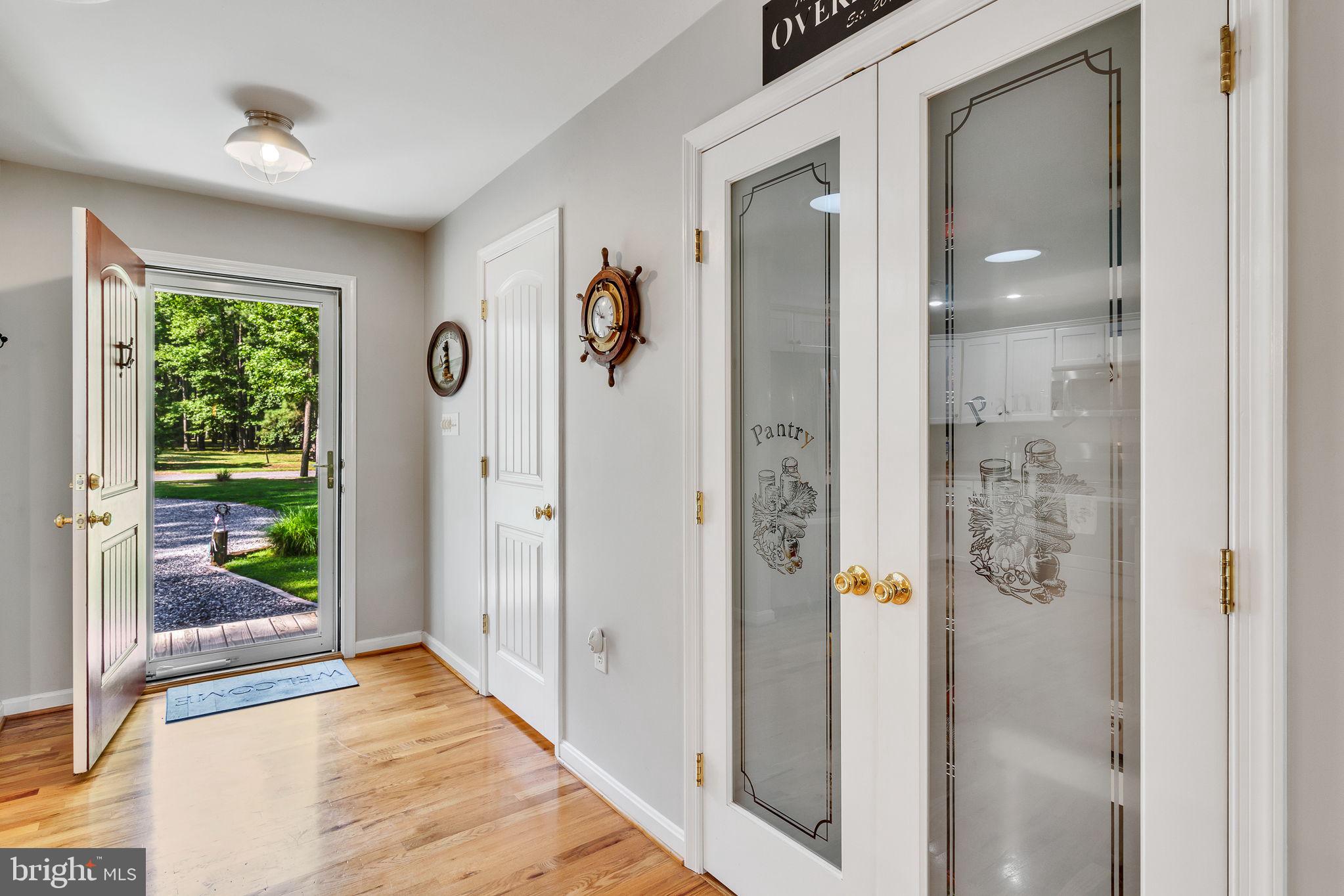 205 Trumps Court Reedville, VA 22539 - Photo 7 of 47 Front door entrance