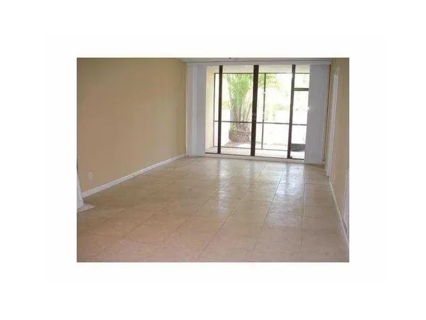 $1,900 | 8433 Forest Hills Drive, Unit 107, Coral Springs, FL 33065