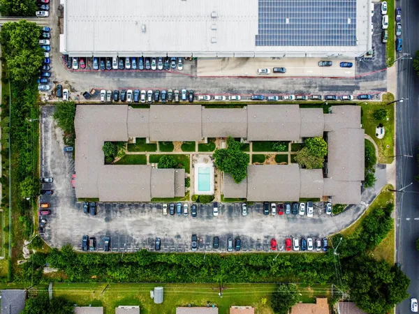 a aerial view of a house with a garden and plants