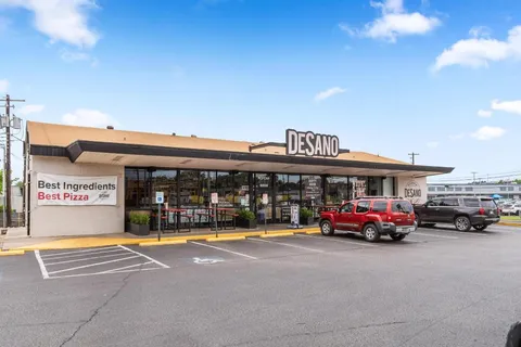 a car parked in front of a building