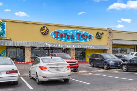 a car parked in front of a building