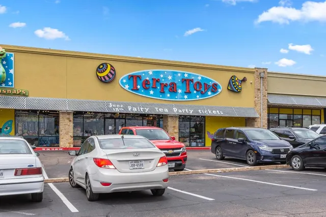 a car parked in front of a building