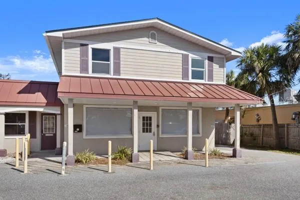 a front view of a house with a porch