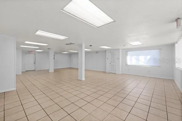 a view of an empty room and window