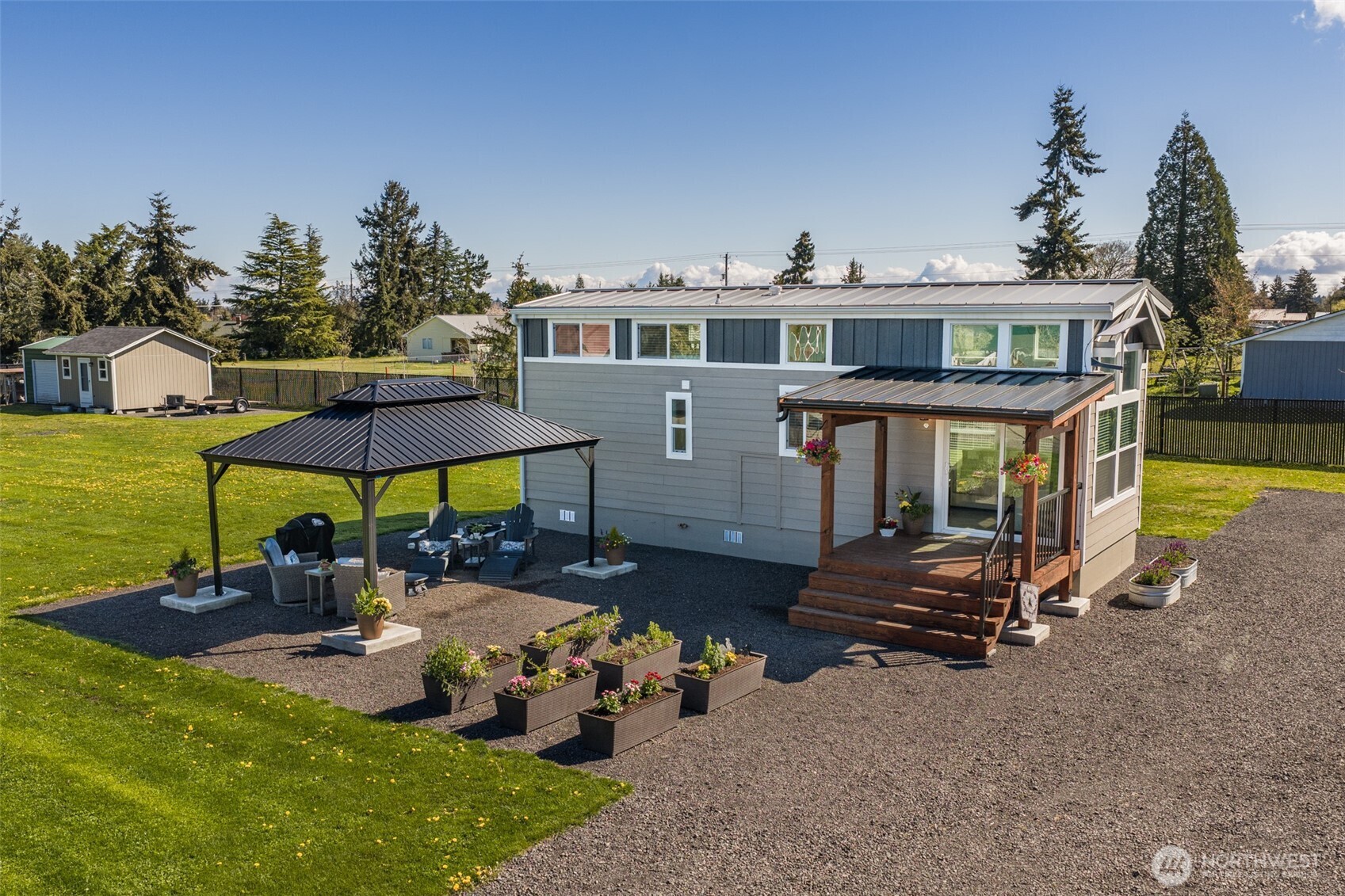 82 Williamson Road Sequim, WA 98382 - Photo 1 of 40 a view of a swimming pool with a patio