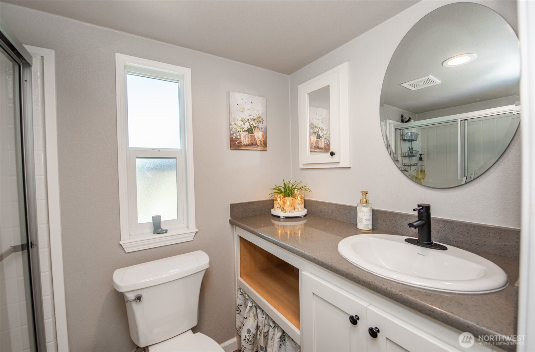 82 Williamson Road Sequim, WA 98382 - Photo 19 of 40 a bathroom with a granite countertop sink mirror and toilet