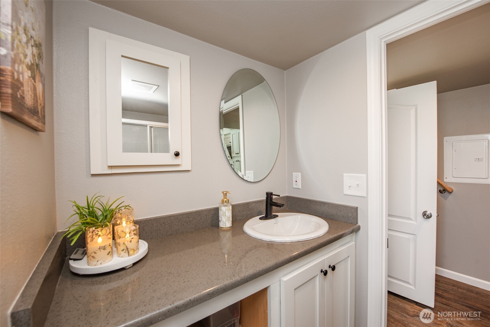 82 Williamson Road Sequim, WA 98382 - Photo 20 of 40 a bathroom with a granite countertop sink and a mirror