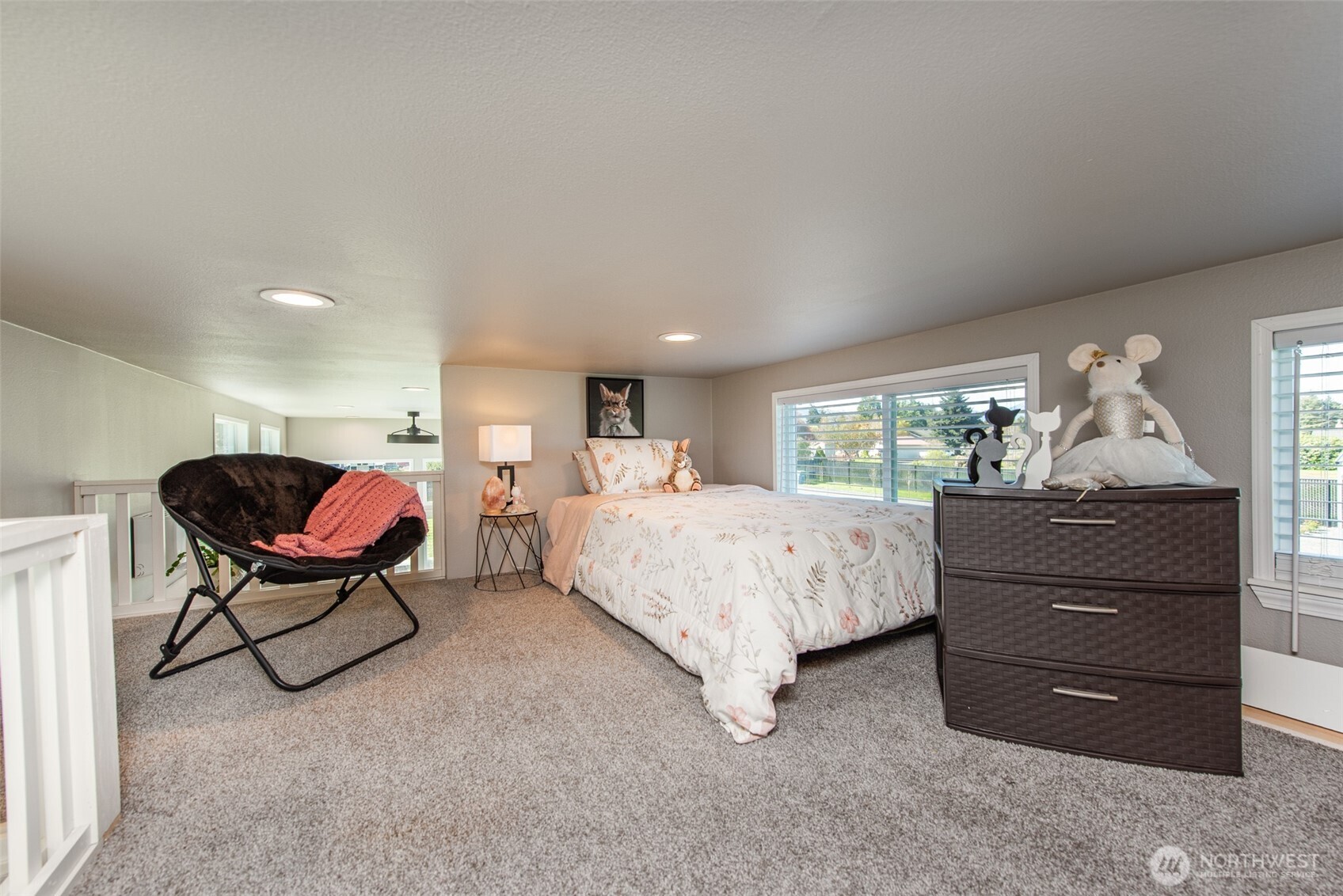 82 Williamson Road Sequim, WA 98382 - Photo 27 of 40 a bed room with a bed window and a dresser