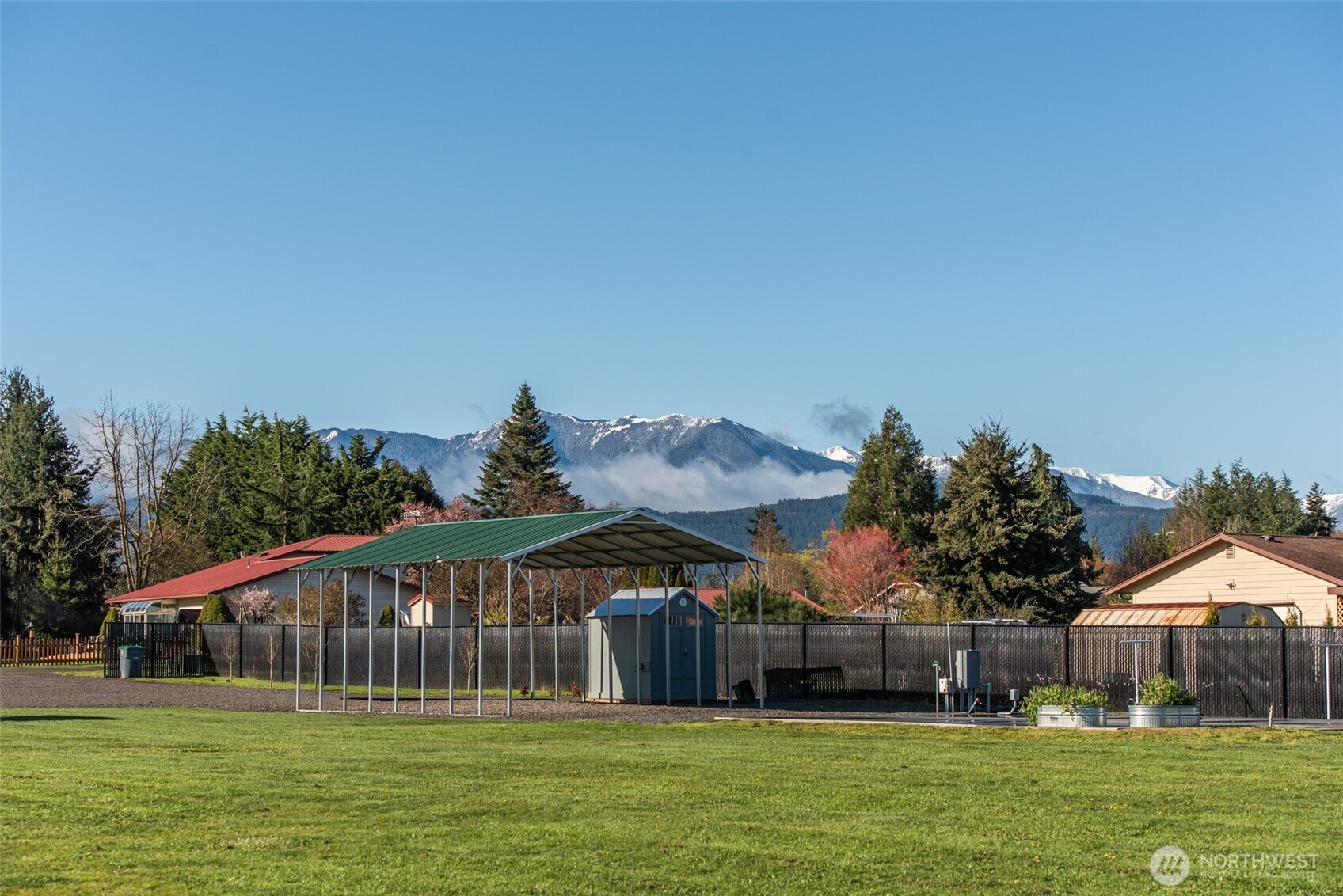 82 Williamson Road Sequim, WA 98382 - Photo 36 of 40 a front view of house with yard and green space