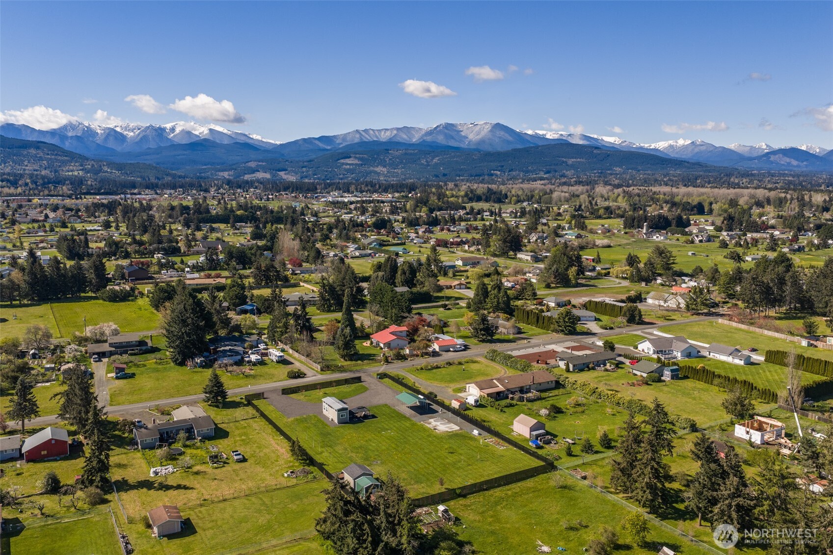 82 Williamson Road Sequim, WA 98382 - Photo 4 of 40 an aerial view of residential houses with outdoor space