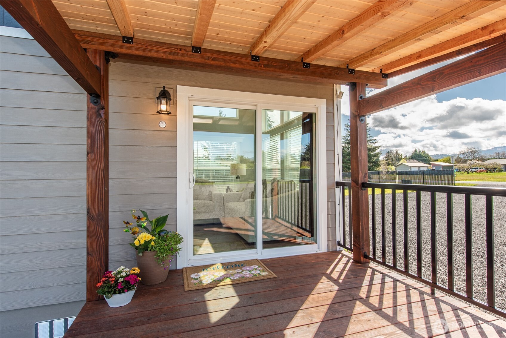82 Williamson Road Sequim, WA 98382 - Photo 8 of 40 a view of a porch with wooden floor